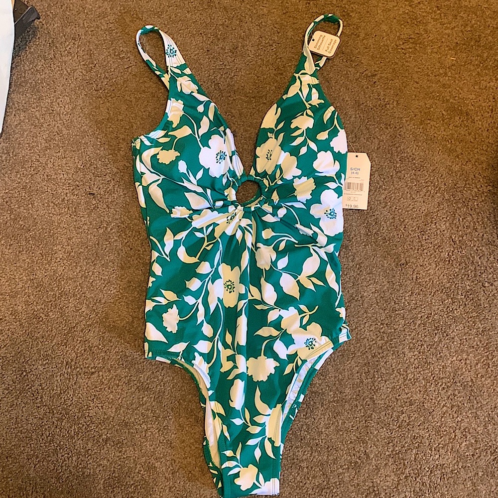 New with tags! NBW.  TimeTru one piece green&white flowered bathing suit